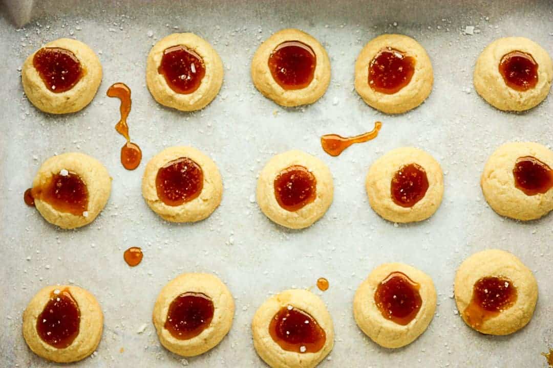 A close up of a metal pan, filled with cookies