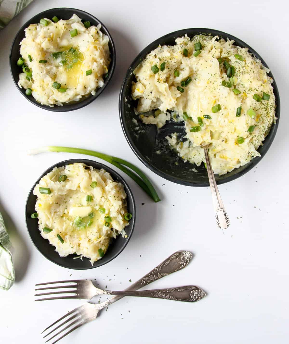 Irish mashed potatoes being served into individual dishes.